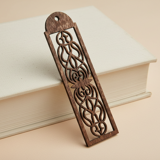 Wooden bookmark with intricate design on a book