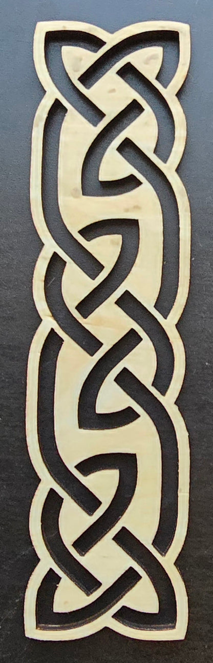 A laser engraved bookmark with a Celtic knotwork design.