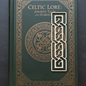 Book titled 'Celtic Lore: Ancient Tales and Symbols' with decorative cover on a dark background
