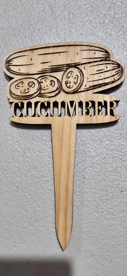 Wooden skewer with a printed design on a gray surface