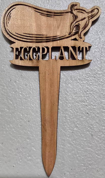 Wooden tool with a handle and blade on a gray background