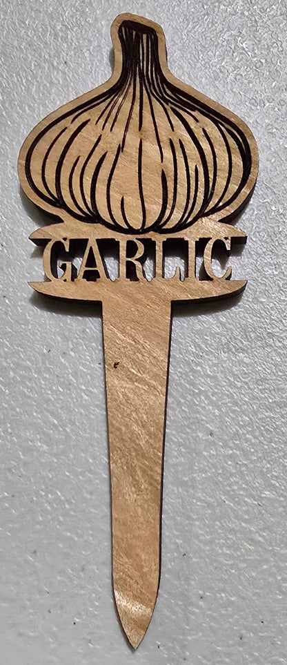 Wooden comb with decorative design on a light gray background