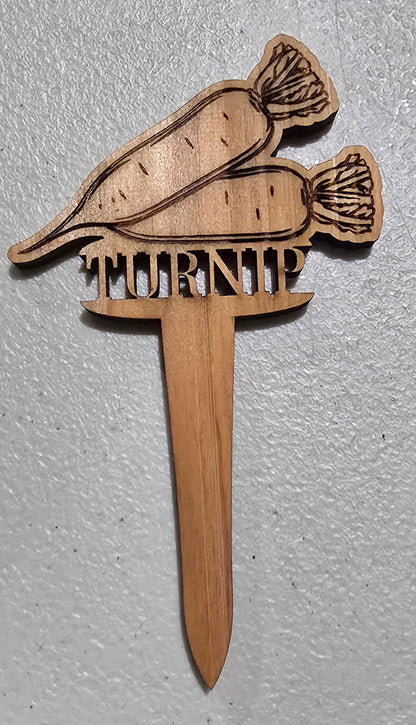 Wooden carrot-shaped tool on a light gray surface