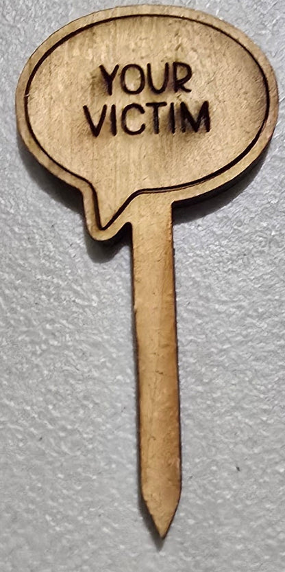 Wooden sign with 'Your Victim' text on a gray background