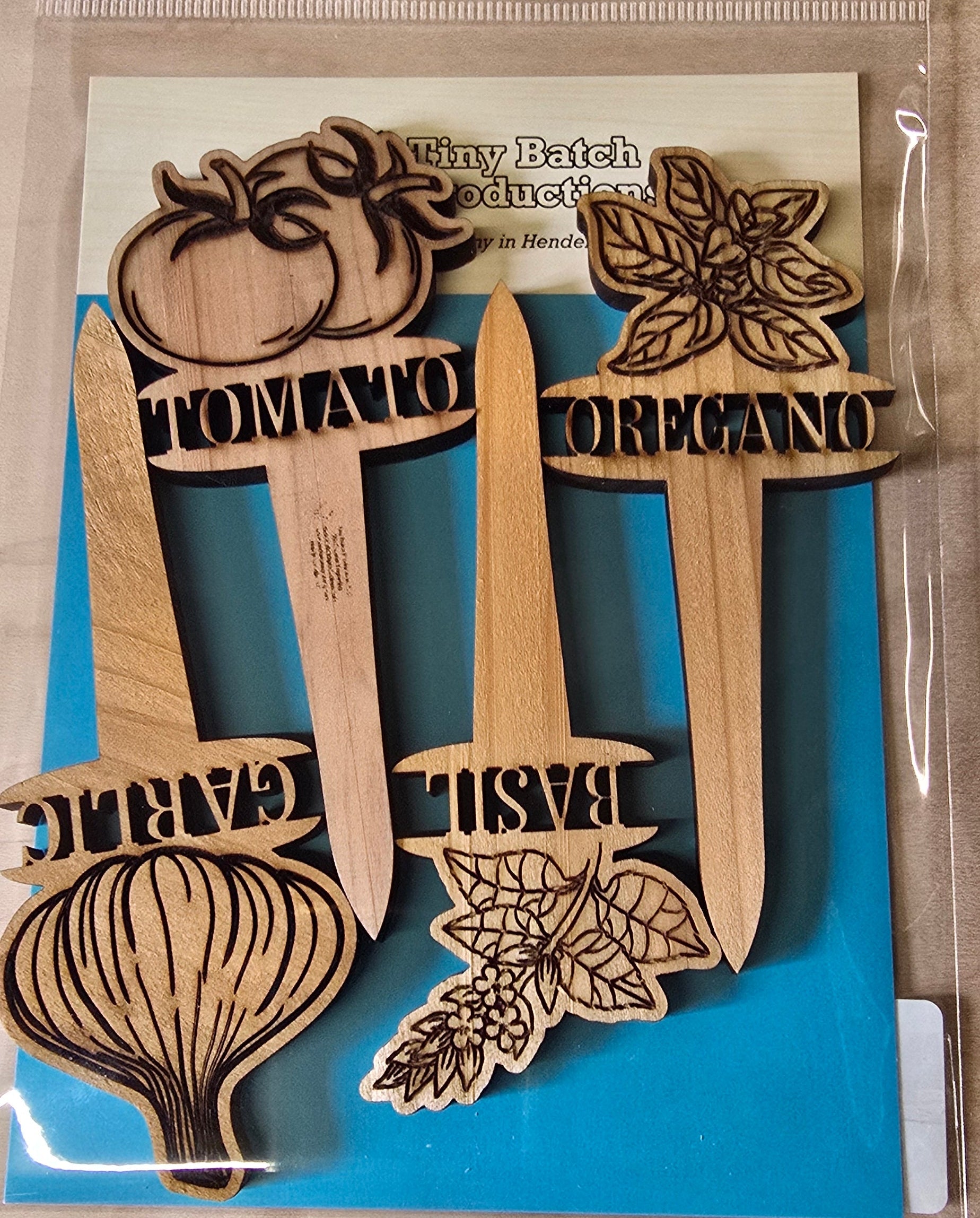 Set of wooden stamps with vegetable designs on a clear background