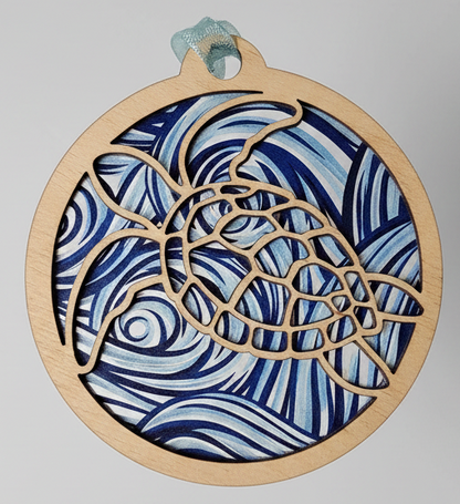 Decorative circular piece with blue wave pattern on a gray background