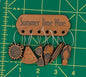 Butterfly on a green cutting mat with grid lines